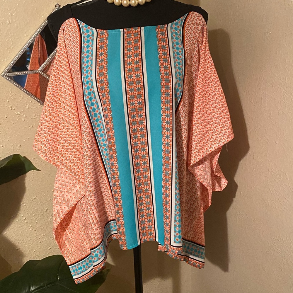 Sheer blouse size XL